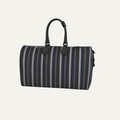 Teddie London bespoke Gunmetal heavy pebble grain textured leather travel duffle bag featuring the asymmetrical Barbican Stripe and polished nickel hardware.
