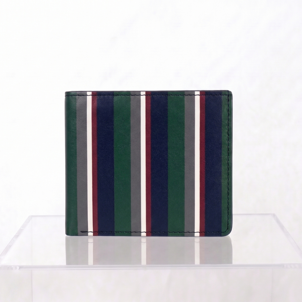 Close up of soft full-grain bovine-calf Nappa leather on the Teddie London Club Stripe wallet with a striped pattern of forest green, navy blue, white, and burgundy, displayed on a clear acrylic stand against a white background.